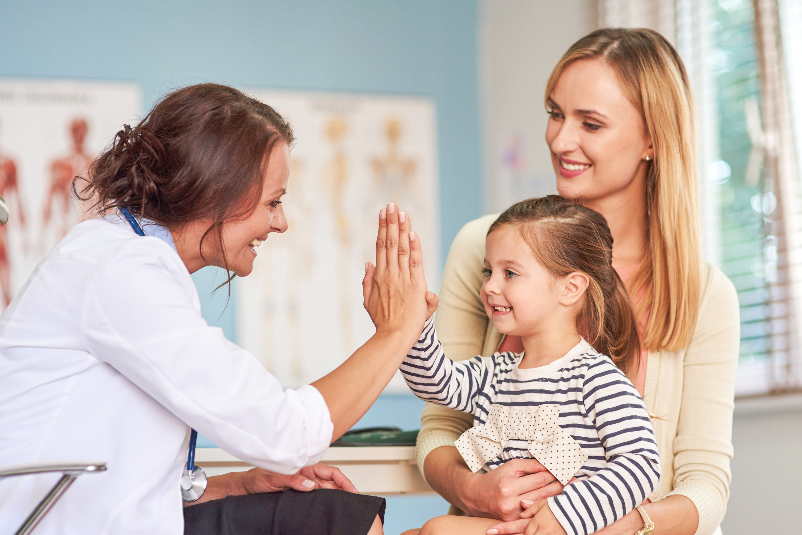 Paediatrician High Five With Kid